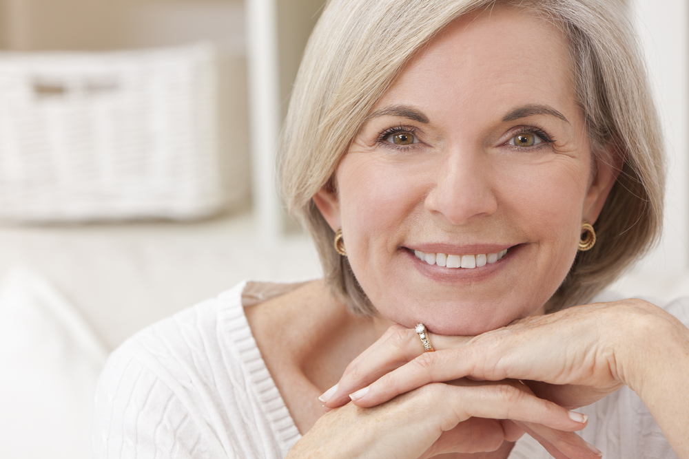 older woman looking at viewer